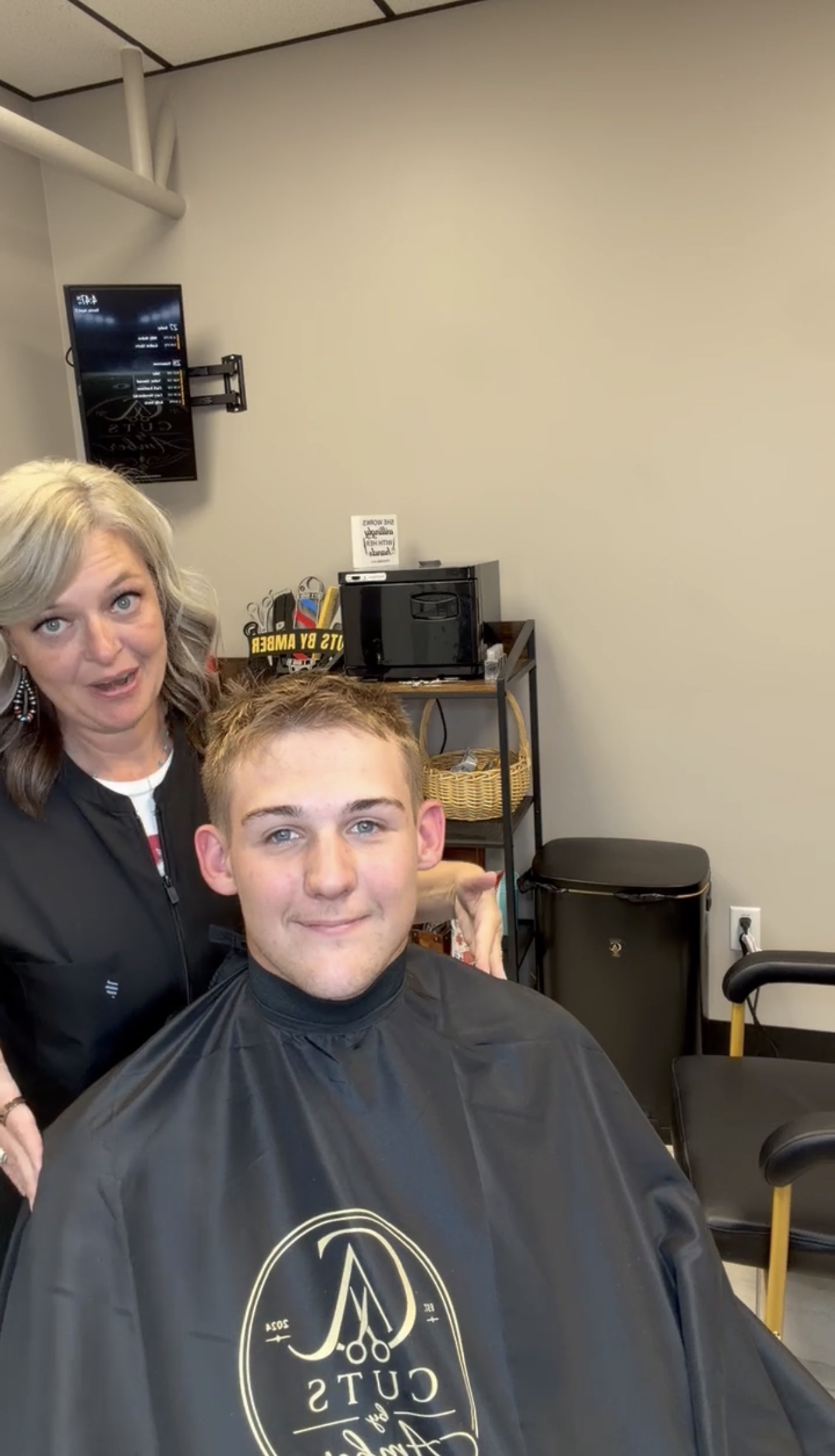 Amber with a client in her barber chair